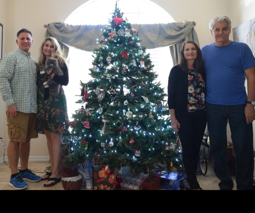 Persian Jewel Cattery family with their Persian cat at Christmas